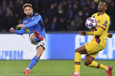Napoli's Dries Mertens, left, scores during the Champions League, Round of 16, first-leg soccer match between Napoli and Barcelona, at the San Paolo Stadium in Naples, Italy, Tuesday, Feb. 25, 2020. (Cafaro/LaPresse Via AP)
