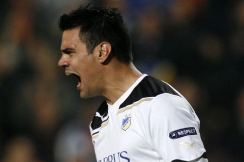Urko Pardo of Apoel, Nicosia, reacts after he repelled the penalty against FC Shakhtar Donetsk during a group G Champions League soccermatch at GSP stadium in Nicosia, Cyprus, Tuesday, Dec. 6, 2011. (APPhoto/Philippos Christou)