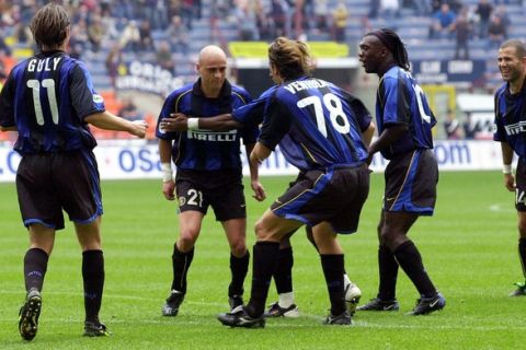Internazionale of Milan Greek defender Grigorios Georgatos, second from left, celebrates with teammates after scoring during an Italian first division match between Inter and Bologna at the San Siro stadium in Milan, Italy, Sunday, Sept. 30, 2001. Inter won 1-0. (AP Photo/Antonio Calanni)         