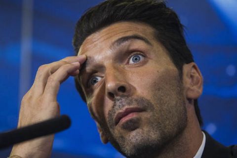 Juventus' goalkeeper Gianluigi Buffon  during a press conference ahead of Wednesday's Champions League soccer match between Atletico Madrid and Juventus, in Madrid, Spain, Tuesday, Sept. 30, 2014. (AP Photo/Andres Kudacki)