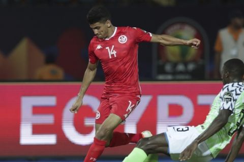 Tunisia's Drager Mohamed kicks the ball during the African Cup of Nations third place soccer match between Nigeria and Tunisia in Al Salam stadium in Cairo, Egypt, Wednesday, July 17, 2019. (AP Photo/Hassan Ammar)