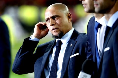 Former Real Madrid Brazilian player Roberto Carlos attends the Champions League Final soccer match between Real Madrid and Liverpool at the Olimpiyskiy Stadium in Kiev, Ukraine, Saturday, May 26, 2018. (AP Photo/Pavel Golovkin)