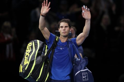 Rafael Nadal of Spain waves to supporters after losing his singles tennis match against David Goffin of Belgium at the ATP World Finals at the O2 Arena in London, Monday, Nov. 13, 2017. (AP Photo/Kirsty Wigglesworth)