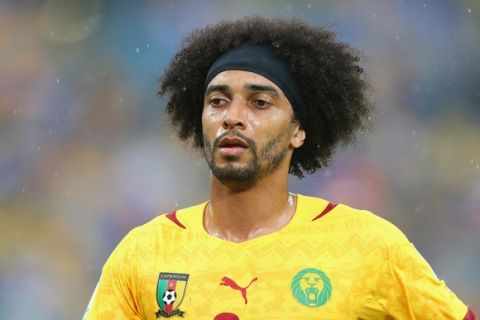NATAL, BRAZIL - JUNE 13:  Benoit Assou-Ekotto of Cameroon looks on during the 2014 FIFA World Cup Brazil Group A match between Mexico and Cameroon at Estadio das Dunas on June 13, 2014 in Natal, Brazil.  (Photo by Jamie Squire/Getty Images)