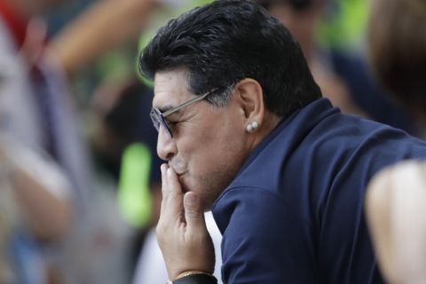 Argentinian soccer legend Diego Armando Maradona blows a kiss prior to the round of 16 match between France and Argentina, at the 2018 soccer World Cup at the Kazan Arena in Kazan, Russia, Saturday, June 30, 2018. (AP Photo/Sergei Grits)