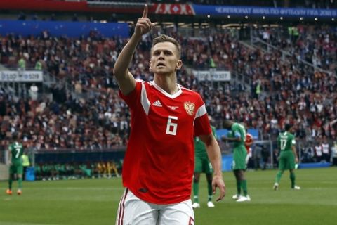 Russia's Denis Cheryshev celebrates after scoring his side's fourth goal during the group A match between Russia and Saudi Arabia which opens the 2018 soccer World Cup at the Luzhniki stadium in Moscow, Russia, Thursday, June 14, 2018. (AP Photo/Pavel Golovkin)