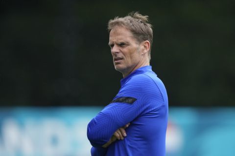 Netherlands' manager Frank de Boer watches his team during the training in Zeist, Netherlands, Sunday, June 20, 2021, a day before the Euro 2020 soccer championship group C match between The Netherlands and North Macedonia. (AP Photo/Peter Dejong)