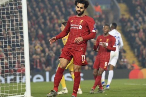 Liverpool's Mohamed Salah reacts after failing to score during the Champions League group E soccer match between Liverpool and Genk at Anfield Stadium, Liverpool, England, Tuesday, Nov. 5, 2019. (AP Photo/Jon Super)