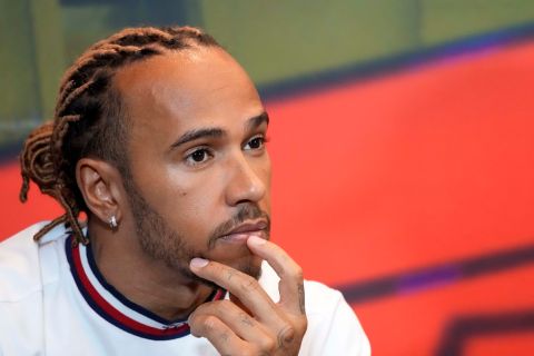 Mercedes driver Lewis Hamilton of Britain attends a news conference at the Baku circuit, in Baku, Azerbaijan, Friday, June 10, 2022. The Formula One Grand Prix will be held on Sunday. (AP Photo/Sergei Grits)