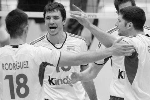 Spain's Israel Rodriguez (18), Miguel Angel Falasca (10), Guillermo Falasca (12), celebrate after winning against the United States during their first round match of the volleyball Men's World Cup in  Matsumoto city, Nagano prefecture, central Japan, Tuesday, Nov. 20, 2007. Spain won the match 21-25,25-20,27-25,25-20. (AP Photo/Itsuo Inouye)