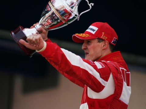 NURBURG, GERMANY - MAY 07:  Michael Schumacher of Germany and Ferrari celebrates winning the European F1 Grand Prix at the Nurburgring on May 7, 2006, in Nurburg, Germany. (Photo by Bryn Lennon/Getty Images) 