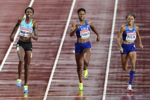 United States' Phyllis Francis, second left, leads the field to win the Women's 400 meters final head of compatriot Allyson Felix, right, and Bahamas' Shaunae Miller-Uibo at the World Athletics Championships in London Wednesday, Aug. 9, 2017. (AP Photo/Martin Meissner)