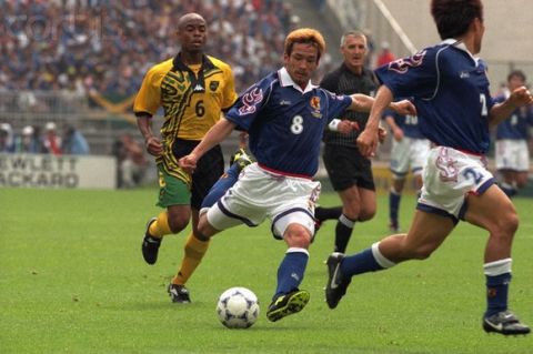 26 Jun 1998, Lyon, France, France --- Hidetoshi Nakata (JAP) during the Japan vs. Jamaica soccer game at the 1998 soccer World Cup. --- Image by © Stephane Ruet/Corbis