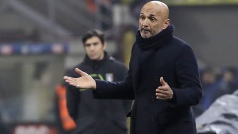 FILE - In this Thursday, Jan. 31, 2019 filer, Inter Milan coach Luciano Spalletti gives instructions during an Italian Cup quarterfinal soccer match between Inter Milan and Lazio at the San Siro stadium, in Milan, Italy. Inter is firmly in its mid-season slump and failure to win at Parma on Saturday would deepen the Nerazzurri crisis. The players left the field to deafening jeers from their own fans after Sunday's 1-0 defeat at home to relegation-threatened Bologna to pile more pressure on coach Luciano Spalletti, amid speculation the club is preparing to replace him with Antonio Conte. Inter CEO Giuseppe Marotta has denied Spallettis job is at risk but the clubs grip on a Champions League place is weakening. (AP Photo/Luca Bruno, File )