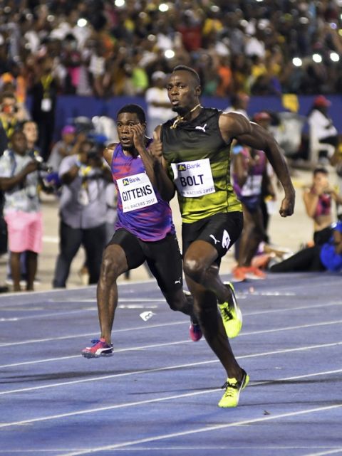 Jamaica's Usain Bolt competes in the "Salute to a Legend" 100 meters during the Racers Grand Prix at the national stadium in Kingston, Jamaica, Saturday, June 10, 2017. Bolted start his final season with his last race on Jamaican soil and plans to retire from track and field after the 2017 London World Championships in August. (AP Photo/Bryan Cummings)