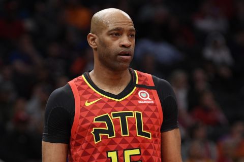 Atlanta Hawks guard Vince Carter (15) stands on the court during the second half of an NBA basketball game against the Washington Wizards, Friday, March 6, 2020, in Washington. The Wizards won 118-112. (AP Photo/Nick Wass)