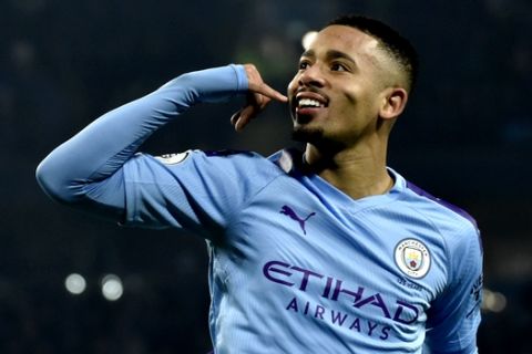 Manchester City's Gabriel Jesus celebrates after scoring his side's opening goal during the English Premier League soccer match between Manchester City and Everton at Etihad stadium in Manchester, England, Wednesday, Jan. 1, 2020. (AP Photo/Rui Vieira)