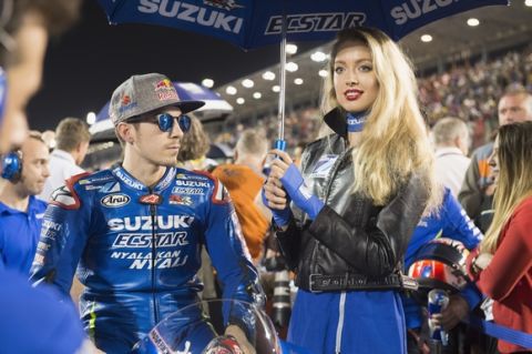 DOHA, QATAR - MARCH 20: Maverick Vinales of Spain and Team Suzuki ECSTAR prepares to start on the grid
 during the MotoGP race during the MotoGp of Qatar - Race at Losail Circuit on March 20, 2016 in Doha, Qatar. (Photo by Mirco Lazzari gp/Getty Images)