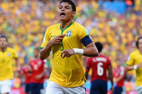 FORTALEZA, BRAZIL - JULY 04:  Thiago Silva of Brazil celebrates scoring his team's first goal during the 2014 FIFA World Cup Brazil Quarter Final match between Brazil and Colombia at Castelao on July 4, 2014 in Fortaleza, Brazil.  (Photo by Jamie McDonald/Getty Images)