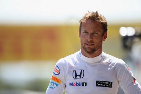 MONTMELO, SPAIN - MAY 09:  Jenson Button of Great Britain and McLaren Honda walks along the pit lane during qualifying for the Spanish Formula One Grand Prix at Circuit de Catalunya on May 9, 2015 in Montmelo, Spain.  (Photo by Mark Thompson/Getty Images)
