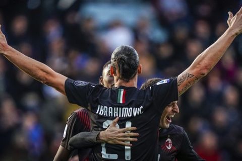 Milan's Zlatan Ibrahimovic celebrates with teammates after scoring his side's second goal during an Italian Serie A soccer match between Cagliari and Milan in Cagliari, Saturday, Jan. 11, 2020. (Spada(/LaPresse via AP)