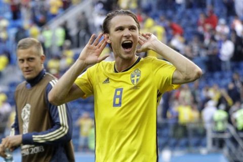 Sweden's Albin Ekdal waves to the fans after the round of 16 match between Switzerland and Sweden at the 2018 soccer World Cup in the St. Petersburg Stadium, in St. Petersburg, Russia, Tuesday, July 3, 2018. Sweden won 1-0. (AP Photo/Gregorio Borgia)