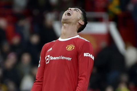 Manchester United's Cristiano Ronaldo reacts after the final whistle during the English Premier League soccer match between Manchester United and Watford at Old Trafford in Manchester, England, Saturday, Feb. 26, 2022. The game ended in a goalless draw. (AP Photo/Rui Vieira)
