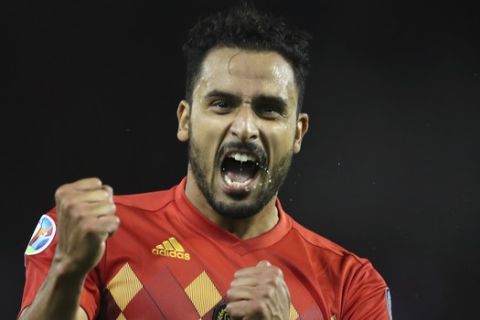 Belgium's Nacer Chadli, right, jubilates after scoring his sides second goal during the Euro 2020 group I qualifying soccer match between Belgium and San Marino at the King Baudouin Stadium in Brussels, Thursday, Oct. 10, 2019. (AP Photo/Francisco Seco)