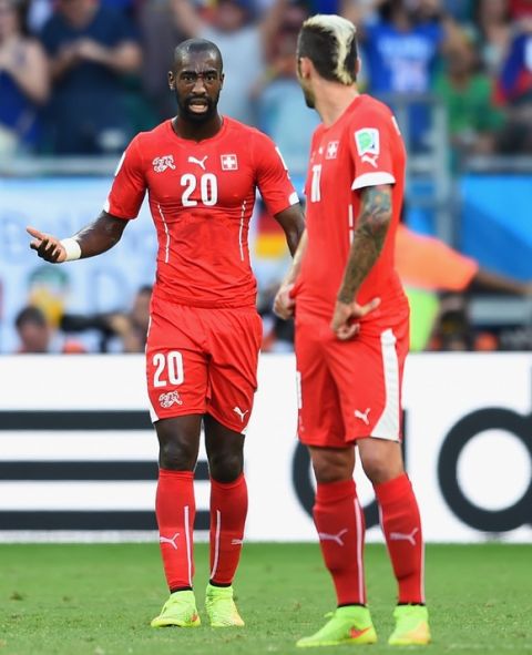 SALVADOR, BRAZIL - JUNE 20: Johan Djourou of Switzerland reacts during the 2014 FIFA World Cup Brazil Group E match between Switzerland and France at Arena Fonte Nova on June 20, 2014 in Salvador, Brazil.  (Photo by Christopher Lee/Getty Images)