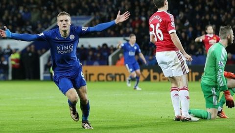 Jamie Vardy celebrates scoring his sides first goal which is eleventh in consecutive Premier League games during the Barclays Premier League Match between Leicester City and Manchester United played at The King Power Stadium, Leicester on 28th November 2015