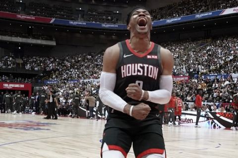 Houston Rockets' Russell Westbrook screams before the start of the team's NBA preseason basketball game against the Toronto Raptors Thursday, Oct. 10, 2019, in Saitama, near Tokyo. (AP Photo/Jae C. Hong)