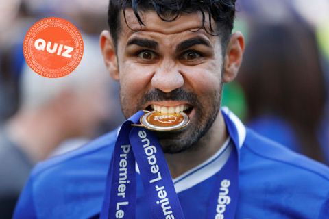 Chelsea's Diego Costa bites his winner's medal after they won the league, following the English Premier League soccer match between Chelsea and Sunderland at Stamford Bridge stadium in London, Sunday, May 21, 2017. (AP Photo/Frank Augstein)