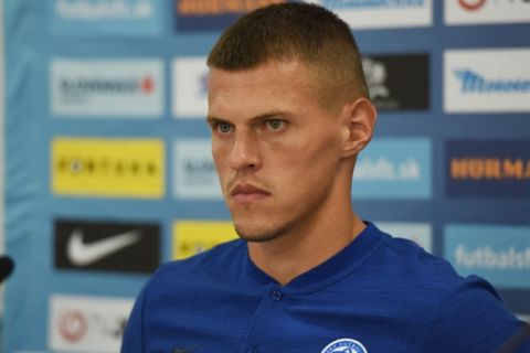 Slovakia's Martin Skrtel pauses during  a press conference at the training center in Senec, Slovakia, Tuesday, Sept. 4, 2018. Slovakia will play against Denmark in a friendly soccer game on Sept. 5. (AP Photo/ Lukas Grinaj)