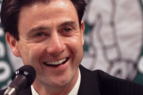Boston Celtics new head coach and president Rick Pitino smiles as he speaks at a news conference in Boston Thursday, May 8, 1997, to introduce him to the local media. (AP Photo/Elise Amendola)