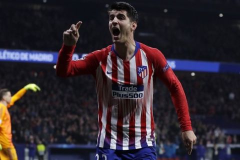 FILE - In this Wednesday, Feb. 20, 2019 file photo, Atletico forward Alvaro Morata reacts after scoring his side's opening goal but the goal was disallowed after a review by VAR during the Champions League round of 16 first leg soccer match between Atletico Madrid and Juventus at Wanda Metropolitano stadium in Madrid.  Morata scored twice to give 10-man Atletico Madrid a 2-0 win at Real Sociedad on Sunday, March 3, 2019 and keep alive its hopes of fighting Barcelona for the Spanish league title. (AP Photo/Manu Fernandez, File)