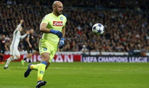 Napoli goalkeeper Pepe Reina runs after the ball during the Champions League round of 16, first leg, soccer match between Real Madrid and Napoli at the Santiago Bernabeu stadium in Madrid, Wednesday Feb. 15, 2017. (AP Photo/Francisco Seco)