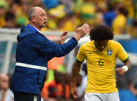 BRASILIA, BRAZIL - JUNE 23:  Head coach Luiz Felipe Scolari of Brazil gestures during the 2014 FIFA World Cup Brazil Group A match between Cameroon and Brazil at Estadio Nacional on June 23, 2014 in Brasilia, Brazil.  (Photo by Buda Mendes/Getty Images)