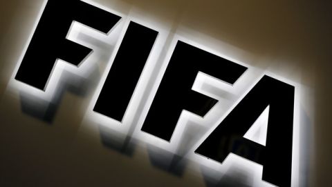 FILE - The Sept. 25, 2015 file photo shows the FIFA logo outside FIFA headquarters in Zurich, Switzerland.  FIFA announced Thursday, March 17, 2016 a  US$ 122 million loss in 2015, a year marked by corruption scandal (AP Photo/Michael Probst, file)