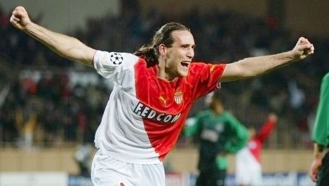 Dado Prso of AS Monaco reacts after scoring a goal against FC Lokomotiv Moscow during their Champions League second leg soccer match, in Monaco, Wednesday, March 10, 2004. (AP Photo/Lionel Cironneau)