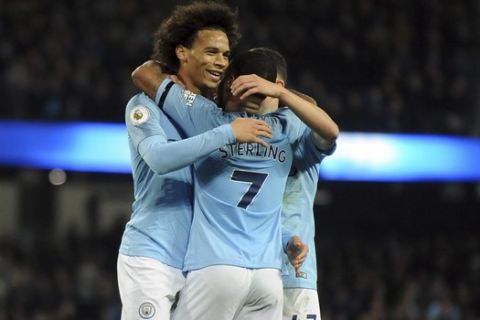 Manchester City's Leroy Sane, left, celebrates with teammates after scoring his side's sixth goal during the English Premier League soccer match between Manchester City and Southampton at Etihad stadium in Manchester, England, Sunday, Nov. 4, 2018. (AP Photo/Rui Vieira)