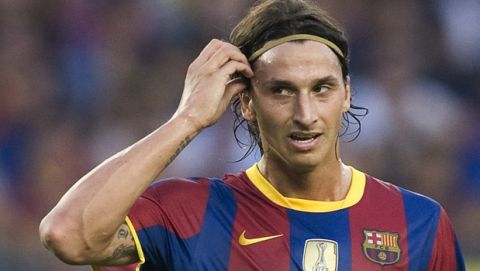 FC Barcelona's Zlatan Ibrahimovic from Sweden reacts during a Joan Gamper Trophy soccer match against AC Milan at the Camp Nou stadium in Barcelona, Spain, Wednesday, Aug. 25, 2010. (AP Photo/David Ramos)