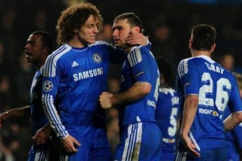 Chelsea's David Luiz (second left) and Branislav Ivanovic (second right) celebrate after the final whistle 