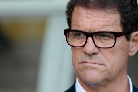 FILE - In this June 14, 2015 file photo, then Russia's coach Fabio Capello watches his players during the Euro 2016 qualifying soccer match between Russia and Austria, in Moscow, Russia. Capello, former AC Milan, Real Madrid, Roma and Juventus coach has announced Monday April 9, 2018  his retirement from coaching and that he's not interested in the open job with Italy's national team. (AP Photo/Ivan Sekretarev, File)
