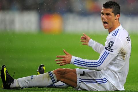 Real Madrid's Portuguese forward Cristiano Ronaldo reacts during the Champions League semi-final second leg football match between Barcelona and Real Madrid at the Camp Nou stadium in Barcelona on May 3, 2011. AFP PHOTO/LLUIS GENE (Photo credit should read LLUIS GENE/AFP/Getty Images)