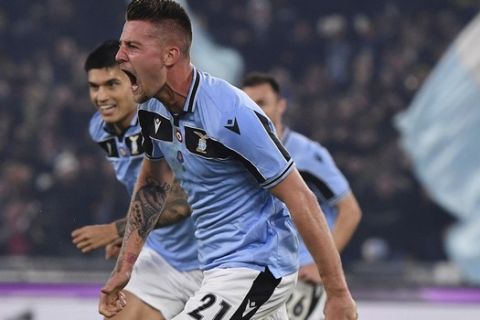 Lazios Sergej Milinkovic-Savic celebrates after he scored his side's second goal during the Serie A soccer match between Lazio and inter Milan, at Rome's Olympic stadium, Sunday, Feb. 16, 2020. (Alfredo Falcone/LaPresse via AP)