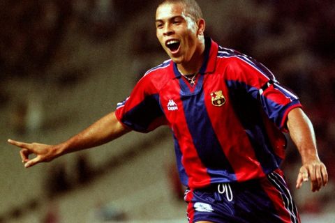 FC Barcelona's Brasilian star striker Ronaldo celebrates after scoring a goal against AEK Larnaca of Cyprus during their first round first leg match of the UEFA Cup Winners Cup September 12 in Barcelona's Olympic stadium.

SPORT SOCCER