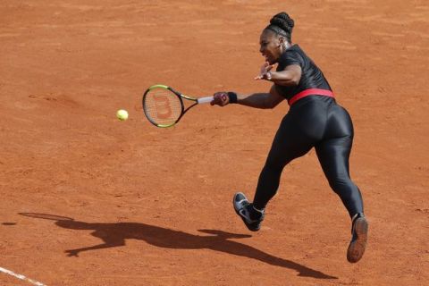 Serena Williams of the U.S. returns a shot against Krystyna Pliskova of the Czech Republic during their first round match of the French Open tennis tournament at the Roland Garros stadium in Paris, France, Tuesday, May 29, 2018. (AP Photo/Michel Euler)