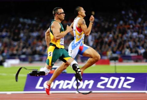 South Africa's Oscar Pistorius (L) runs during his men's 400m semi-final at the London 2012 Olympic Games at the Olympic Stadium August 5, 2012.   REUTERS/Michael Dalder (BRITAIN  - Tags: SPORT ATHLETICS SPORT OLYMPICS)   ORG XMIT: OLYJK155