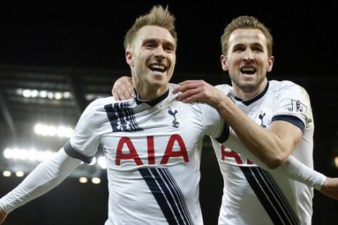 Tottenham's Christian Eriksen, left, celebrates  with Harry Kane after scoring his sides second goal during the English Premier League soccer match between Manchester City and Tottenham Hotspur's at the Etihad Stadium in Manchester, England, Sunday Feb. 14, 2016. (AP Photo/Jon Super)