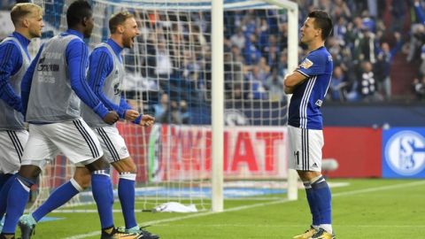 Schalke's Yevhen Konoplyanka, right, waits for celebrations after he scored his side's second goal during the German Bundesliga soccer match between FC Schalke 04 and RB Leipzig at the Arena in Gelsenkirchen, Germany, Saturday Aug. 19, 2017. (AP Photo/Martin Meissner)